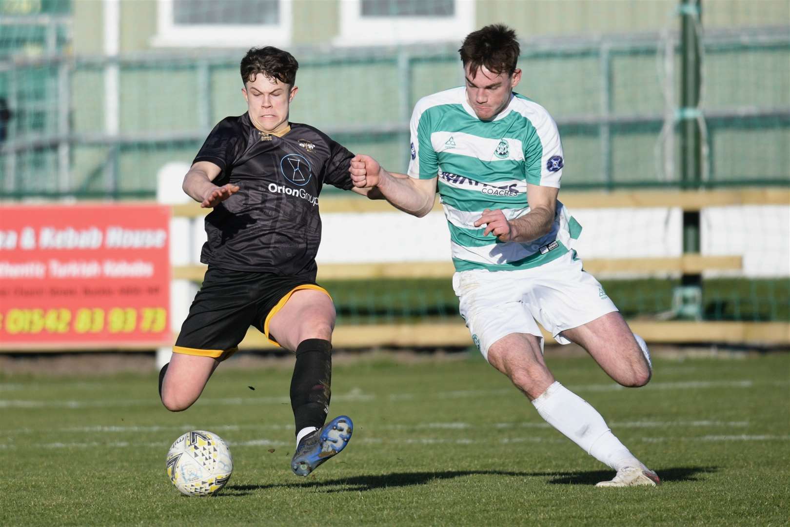 Jack Murray (right) scored a stoppage time penalty for Buckie but they lost a winner soon after. Picture: Daniel Forsyth