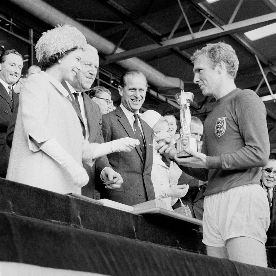 The Queen handing over the World Cup trophy in 1966 (PA)