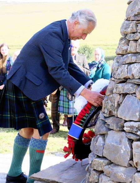 The prince lays his wreath. (Photo Becky Saunderson)