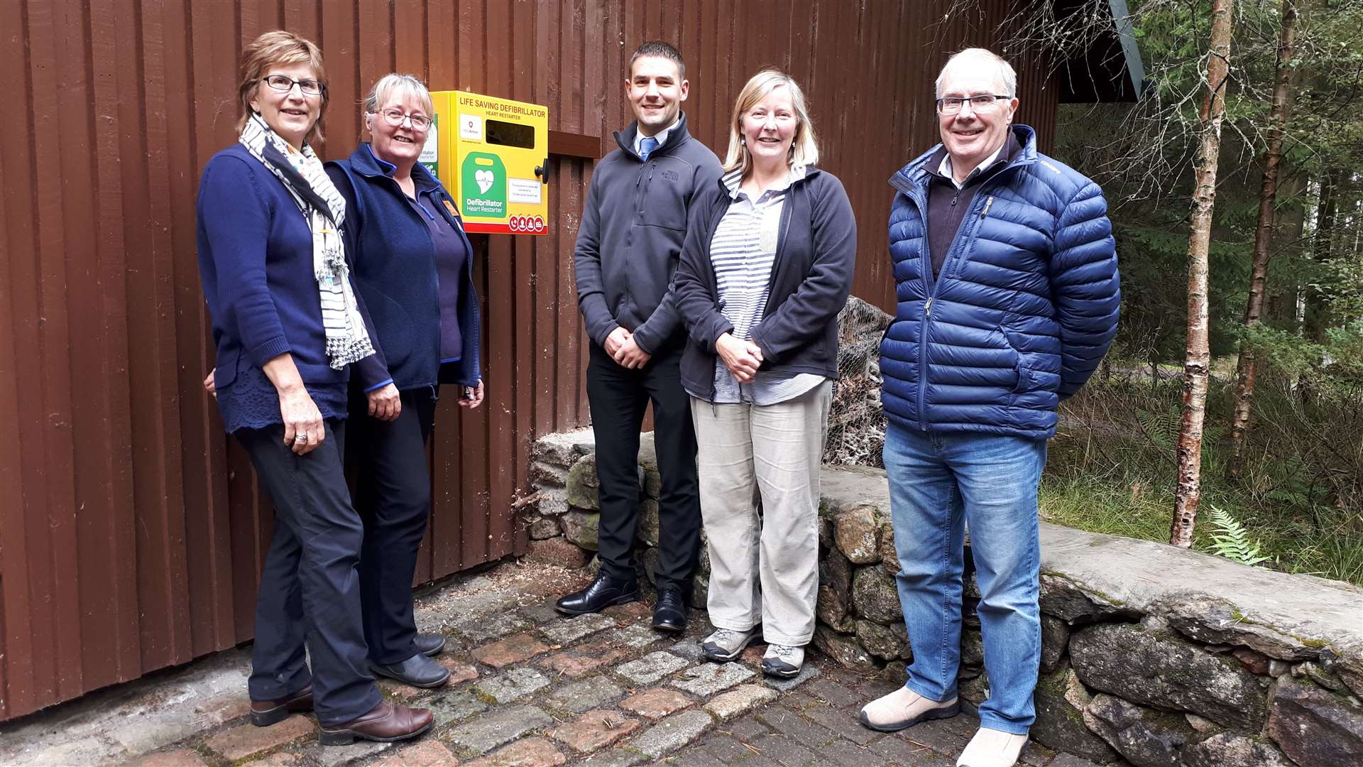 Ann Baillie (left) Bennachie centre trustee, Jan Lythgoe, Bennachie Visitor Centre warden, Aberdeenshire Council's Malcolm White, Pat Sturrock, chairwoman of the Bennachie Centre Trust and trustee John Nicol with the new defibrillator.