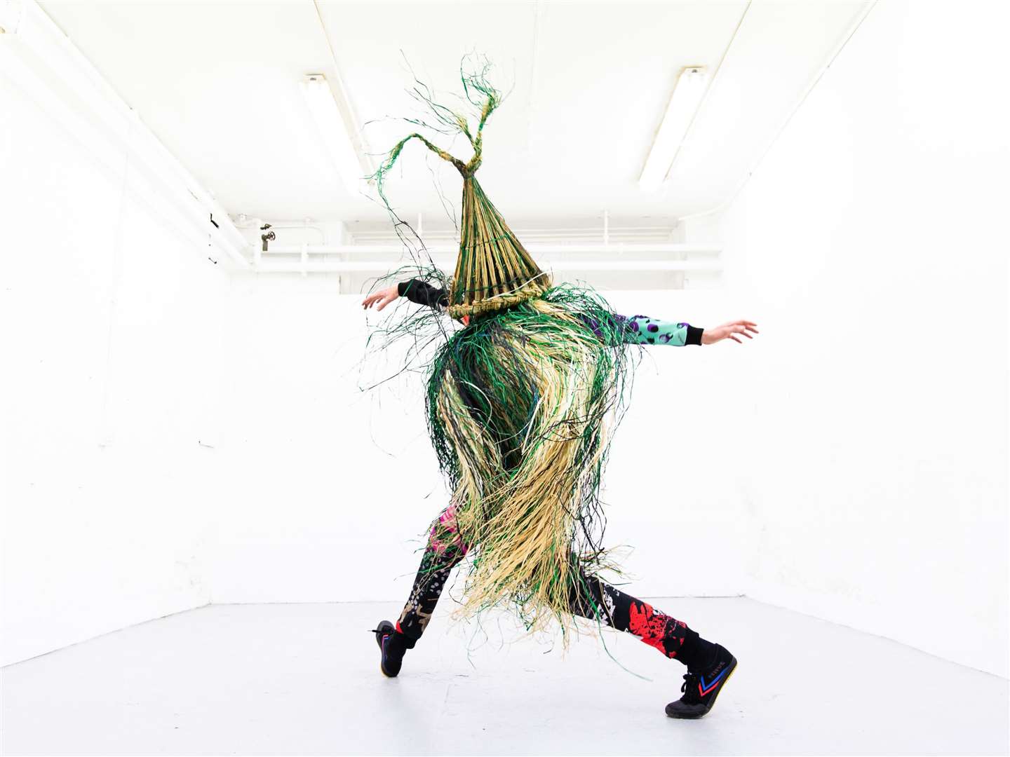 Jack Anderson performing in Rob Heaslip’s pop-up show Strawboys, with costume design by Alison Brown. Picture: Amy Sinead