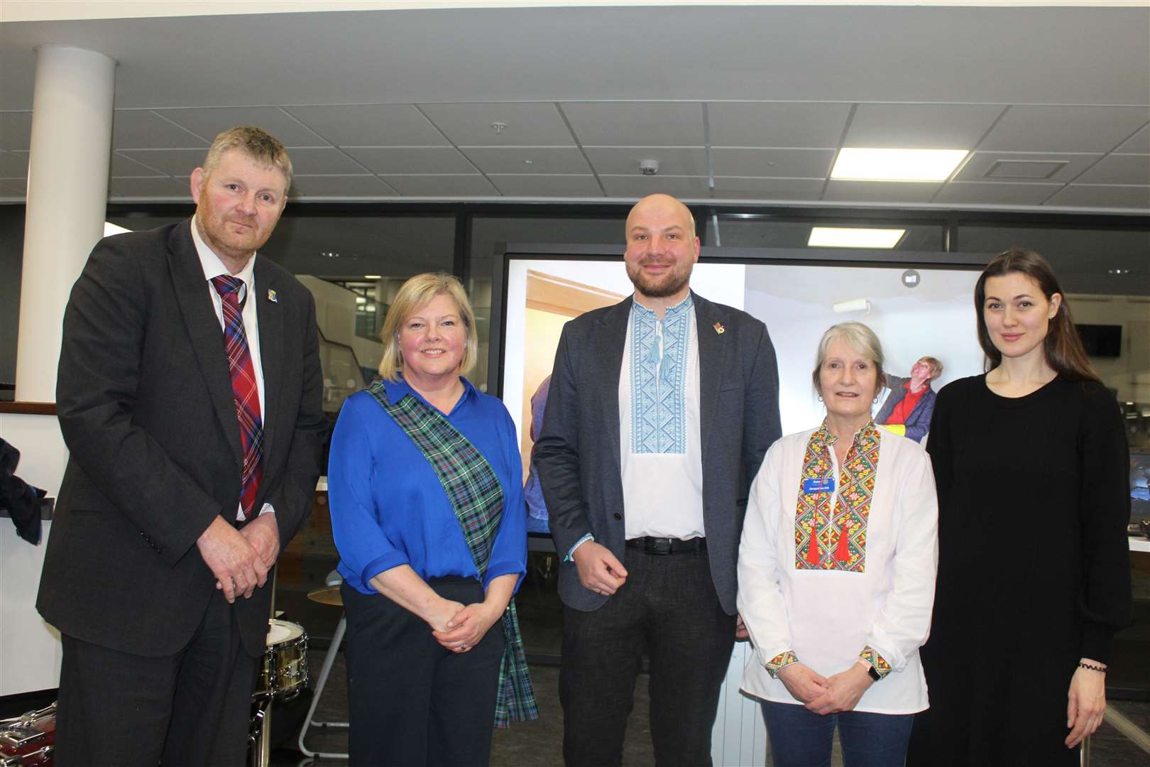 Inverurie academy head Neil Hendry, Provost Judy Whyte, Erik Avetisov. Ythan Valley Rotary president Jacqeline Hill, Olha Avetisova at Monday's Ukraine-Scotland social evening at Inverurie community campus. Picture: Griselda McGregor