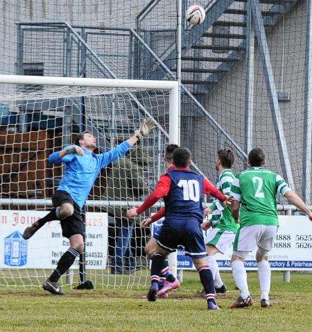 Andy MacAskill sends a looping header over Buckie keeper Andy (Photo by Eric Cormack SPP).