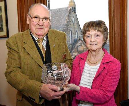 Hazel Johnston receives her award from Watson Smith of Keith Rotary Club.
