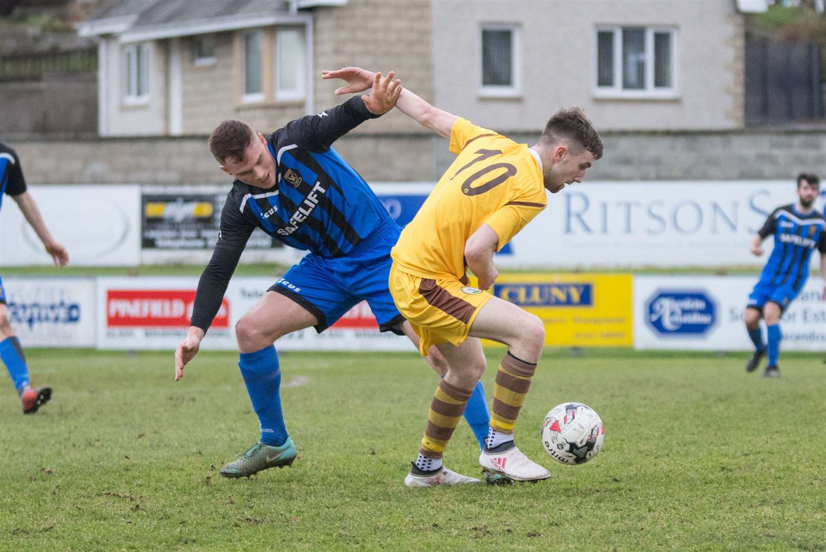 Bradley Manson (left) in action for Huntly. Picture: Becky Saunderson