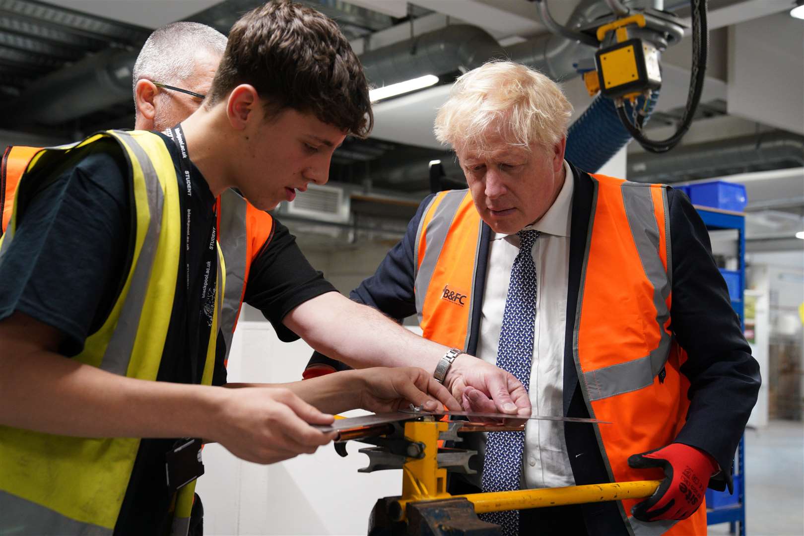 Prime Minister Boris Johnson meeting student Cassidy in Blackpool (PA)