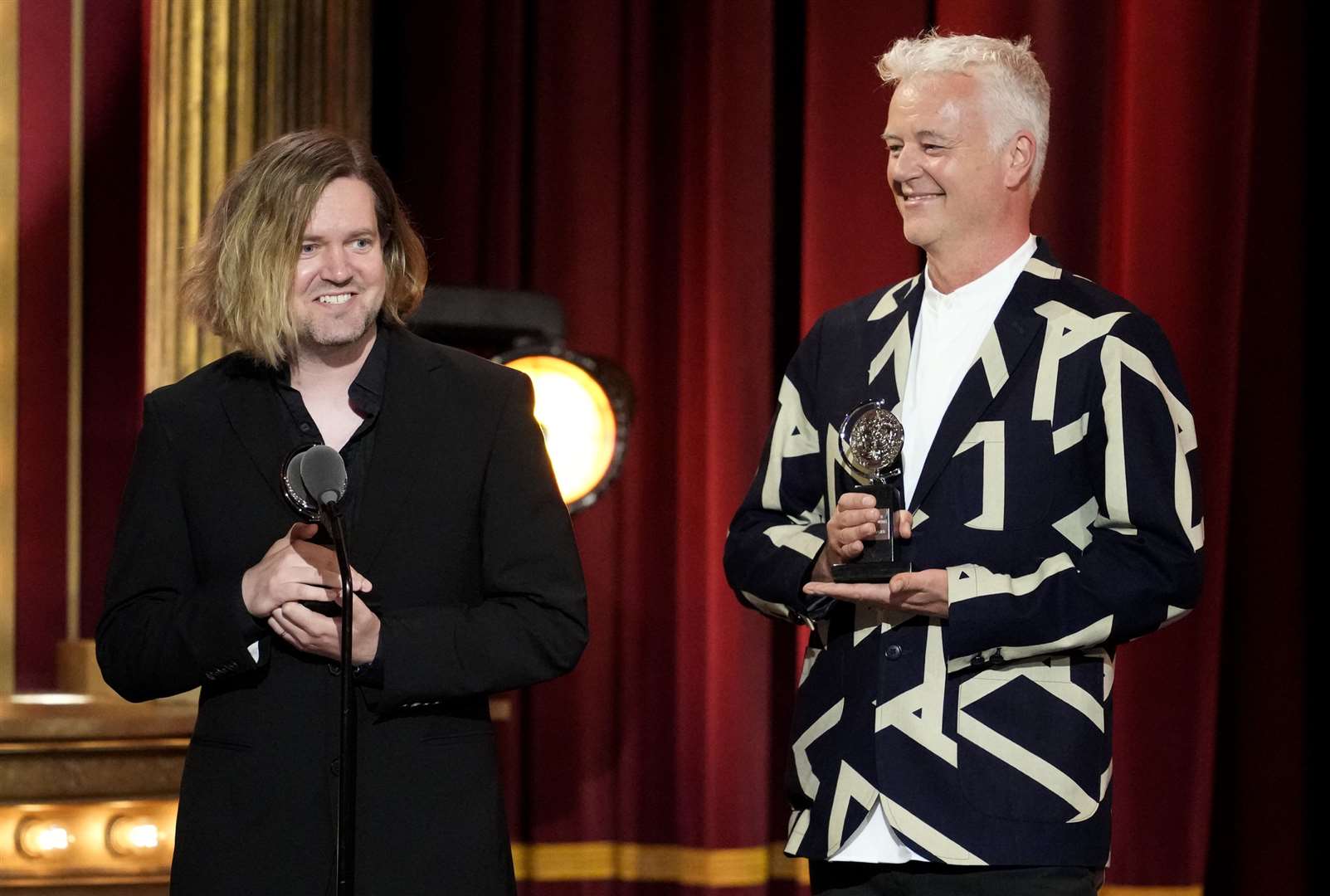 Andrzej Goulding, left, and Tim Hatley accept the award for best scenic design of a play for Life Of Pi at the 76th annual Tony Awards (Charles Sykes/Invision/AP)