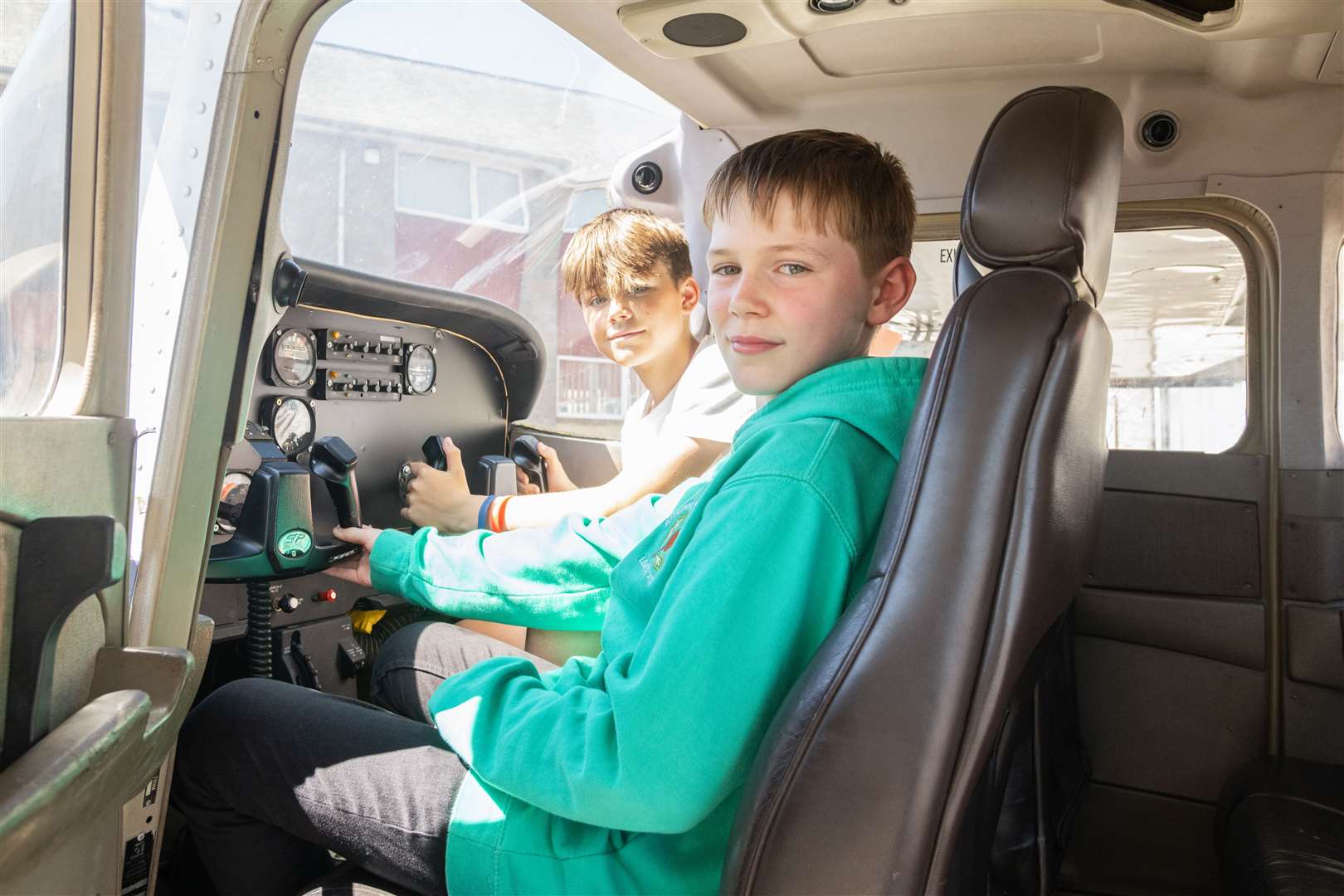 From left: Connor Smith and Finlay McKerrell sitting in the cockpit from Mission Aviation Fellowship at Keith Grammar School...Picture: Beth Taylor.