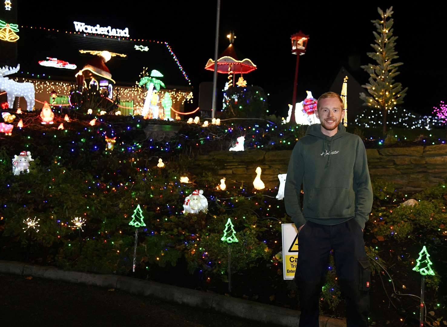 Callum Stuart outside his house that's all decked out with decorations...Picture: Beth Taylor.