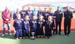 Deveronvale Under 15 girls squad and coaches with their league cup.