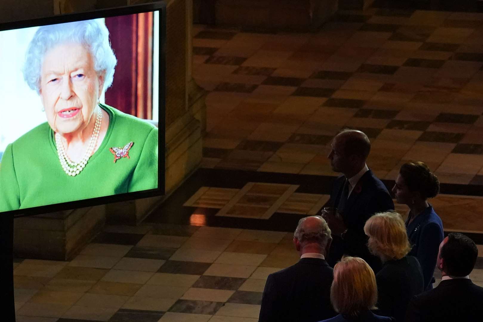 The Prince of Wales and the Duchess of Cornwall with the Duke and Duchess of Cambridge watching the Queen’s Cop26 video message (Alberto Pezzali/PA)