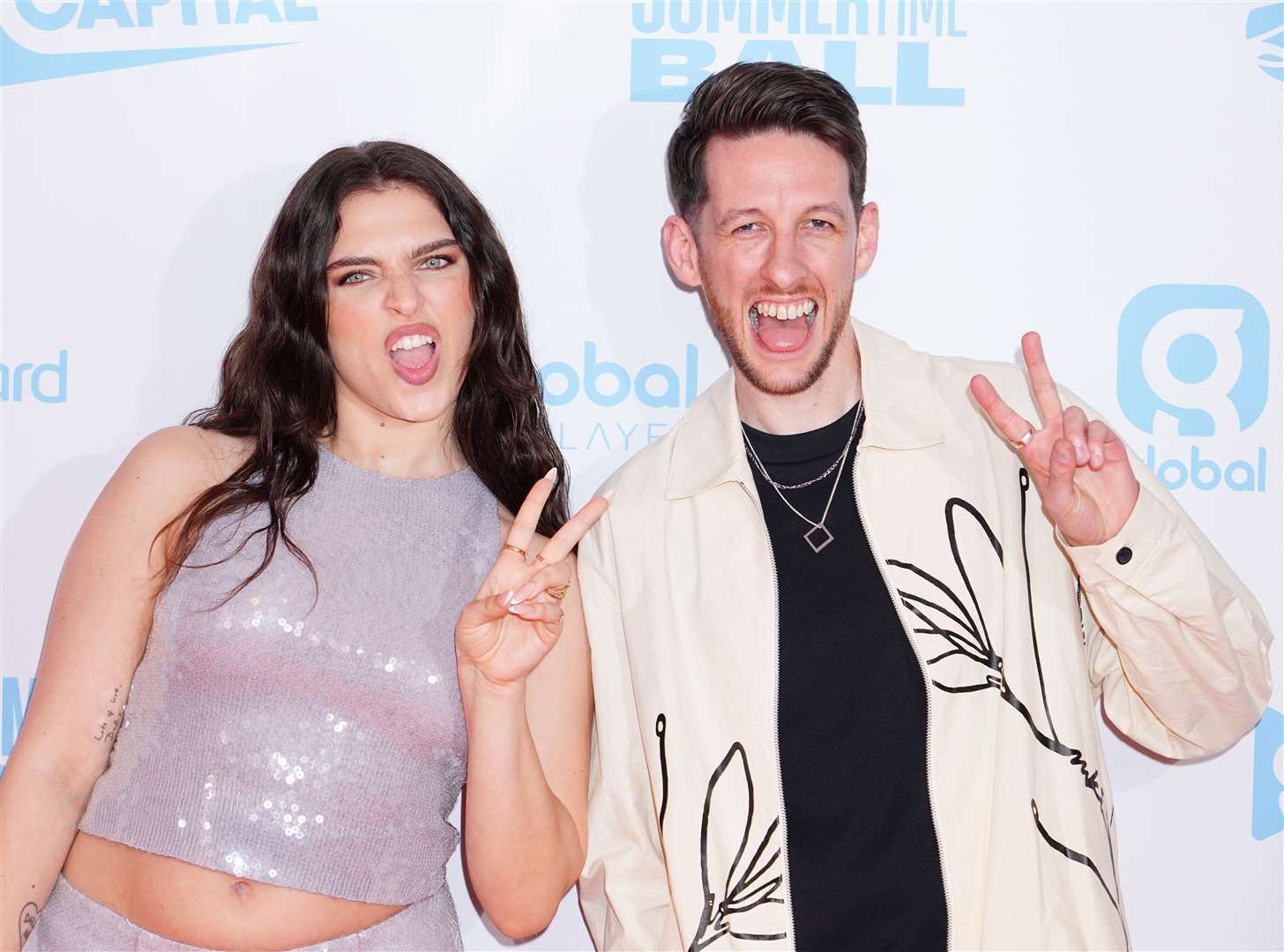 Mae Muller and Sigala backstage during Capital’s Summertime Ball (Ian West/PA)
