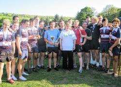 Marjory Nicholson made the presentation of prizes to Aberdeen Grammar players and CP Select. Colin Philips is pictured with the trophy on her right.