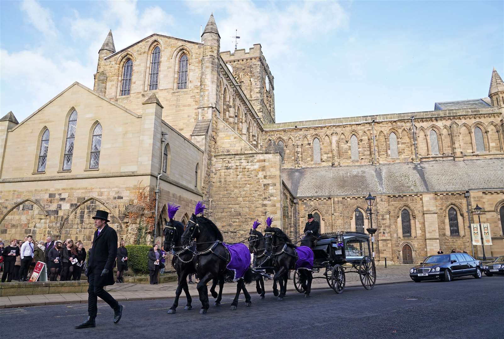 The funeral cortege for Holly Newton leaves Hexham Abbey (Owen Humphreys/PA)
