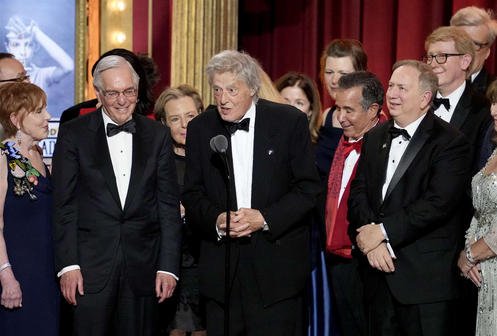 Sir Tom Stoppard, center, and members of the company of Leopoldstadt accept the award for best play at the 76th annual Tony Awards (Charles Sykes/Invision/AP)