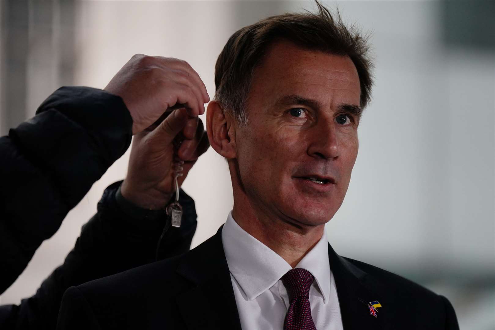 Chancellor Jeremy Hunt gives a television interview the morning after his autumn statement (Aaron Chown/PA)