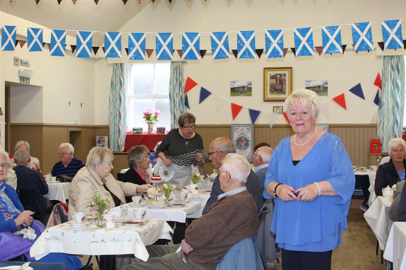 Social convenor Molly Conn welcomed visitors to the Platinum afternoon tea in the hall at St Andrews church, High Street, Inverurie on Saturday. Picture: Griselda McGregor