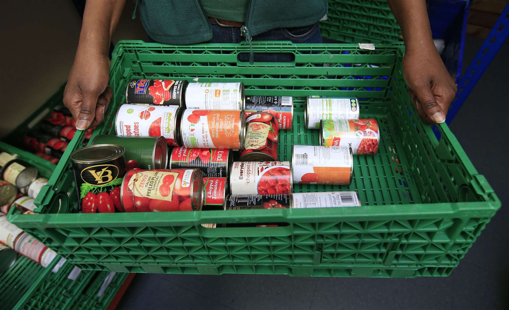 Increased food prices have pushed UK families towards relying more on food banks (Jonathan Brady/PA)