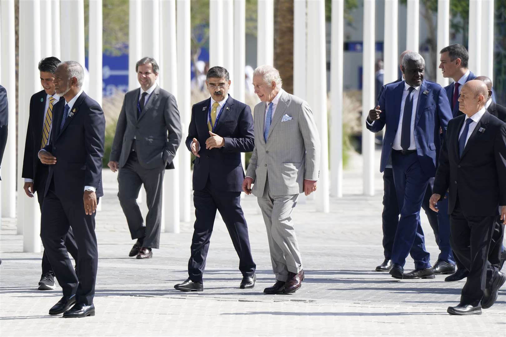 Charles joined world leaders in walking to the World Climate Action Summit in Dubai (Andrew Matthews/PA)