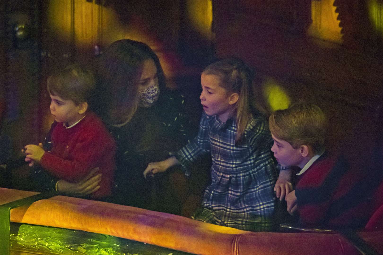 The Duchess of Cambridge with Prince Louis, Princess Charlotte and Prince George at the performance (Aaron Chown/PA)