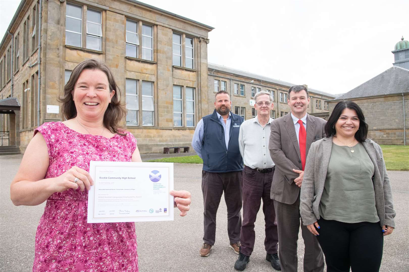 BCHS Principal Teacher of Modern Languages Catherine Eadon (front left) shows off the Gold Scottish Languages Employability Award, joined by (from back) Ross Keddie (Chivas Bros), Jonathan Curtis (ASL), BCHS Rector Neil Johnson and Samira Nicholson (DYW Moray). Picture: Daniel Forsyth