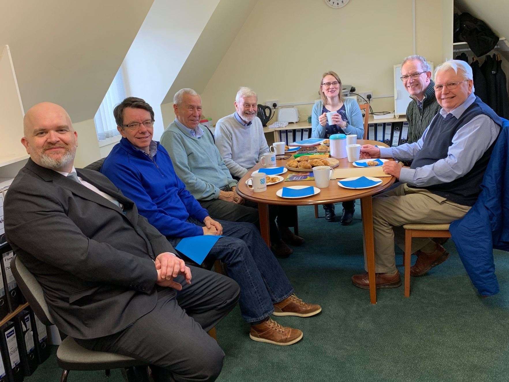 Co-op Funeralcare's Scott Wilson Richard, Chris, Alan from Ellon Castle Gardens, Barbara Last Co-op member pioneer and Andy and Keith from Ellon's Men Shed discussing plans.