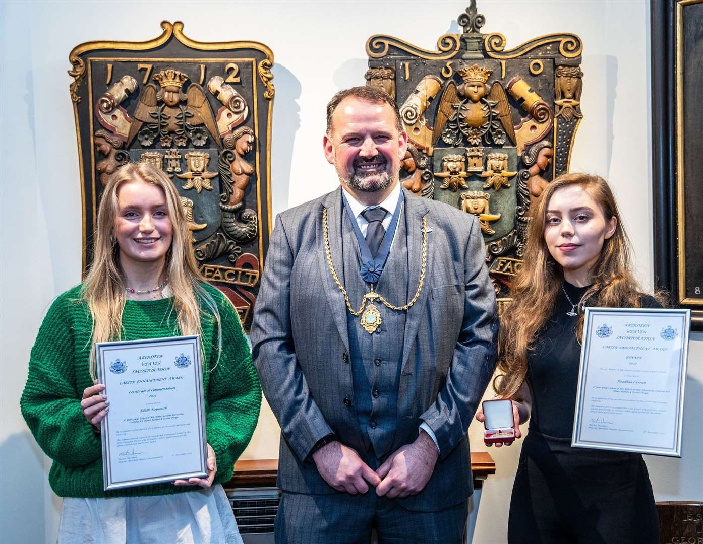 Martin Wiseman, Deacon of Aberdeen Weavers’ Incorporation, congratulates winner Ruadhan Curran (right) and runner-up Eilidh Naysmith. Picture: Martin Parker, Gatehouse Design Agency
