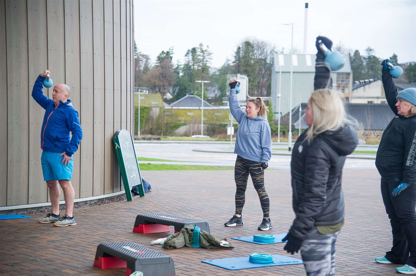 People warm up at an outdoor circuits class at Moray Sports Centre, on Elgin's Linkwood Road. Picture: Becky Saunderson.