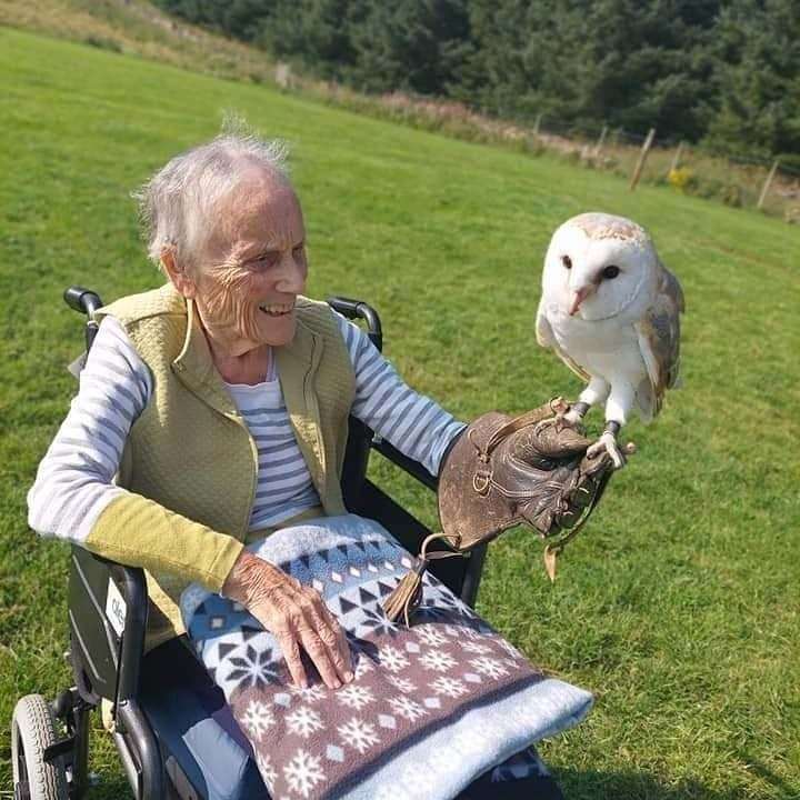 Cathy Jack gets up close with an owl.