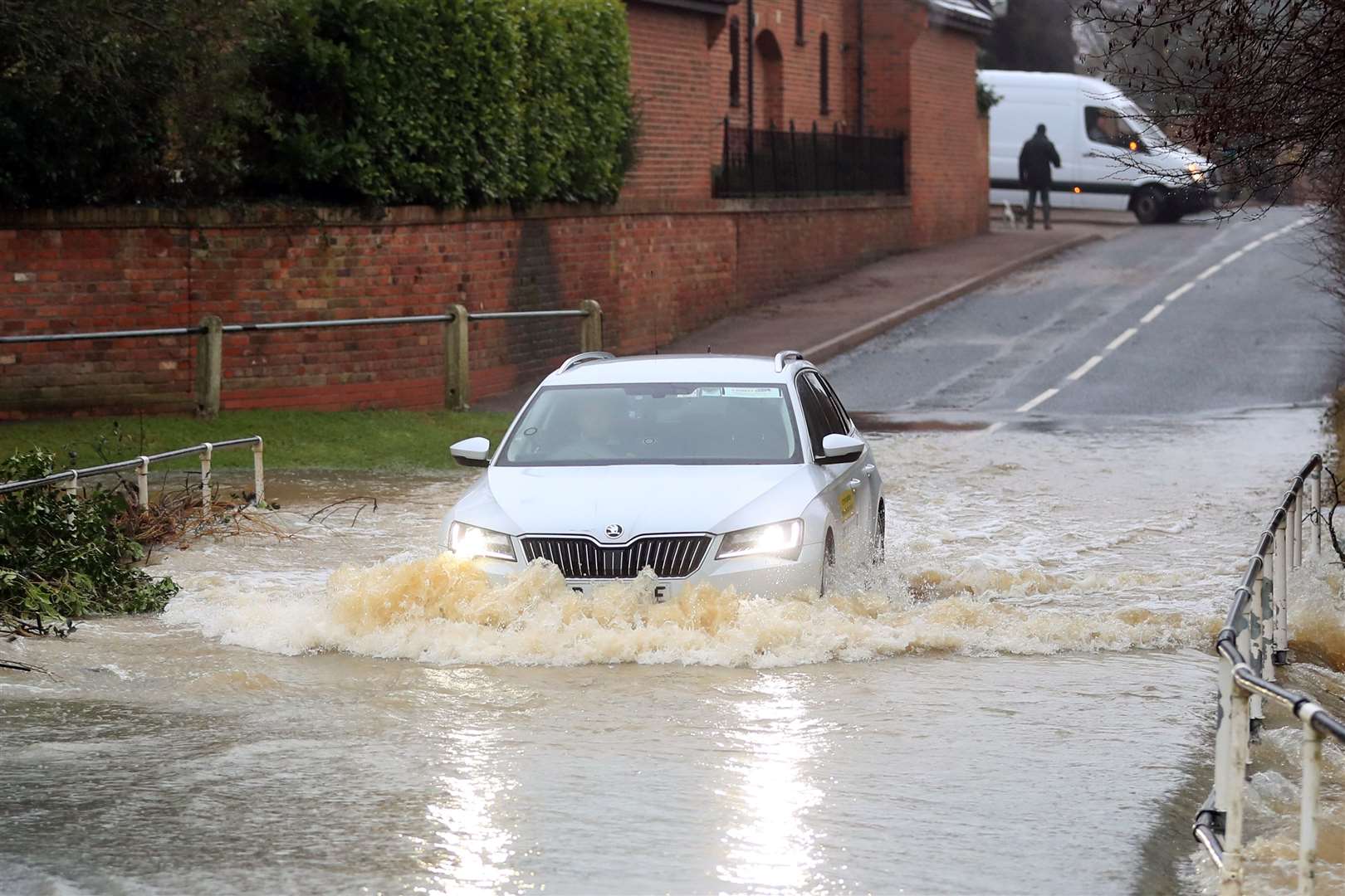 A car on a flooded road in Bottesford, Leicestershire (Mike Egerton/PA)