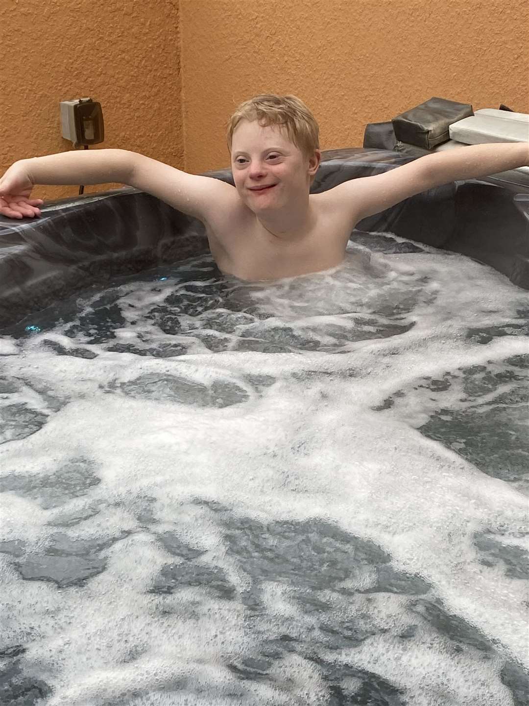Hot tubs help ease the pain in Corey's muscles and joints.