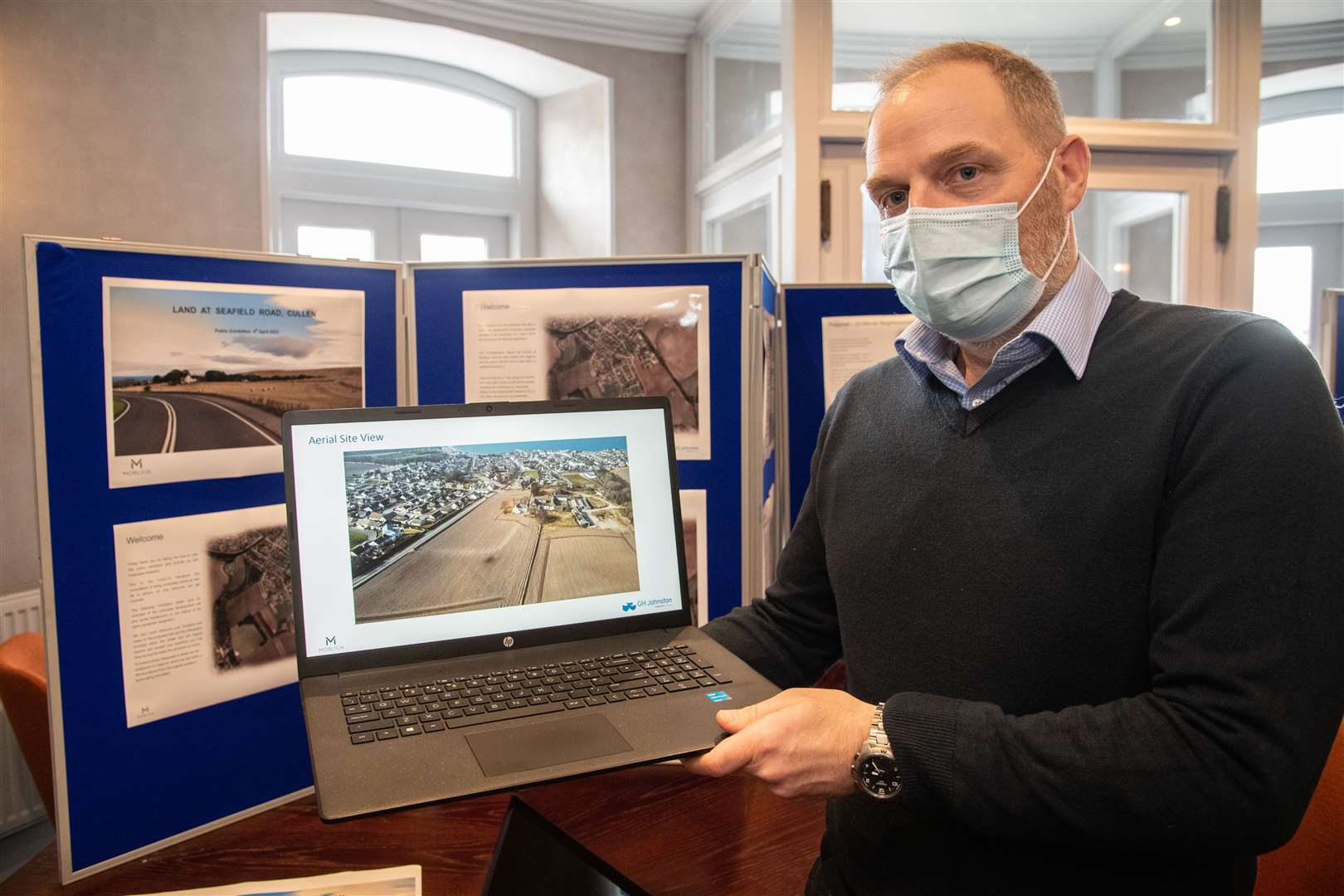 Kenny Shand, Senior Planning Consultant at GH Johnston, shows off some of the proposals for the new Cullen housing development. Picture: Daniel Forsyth