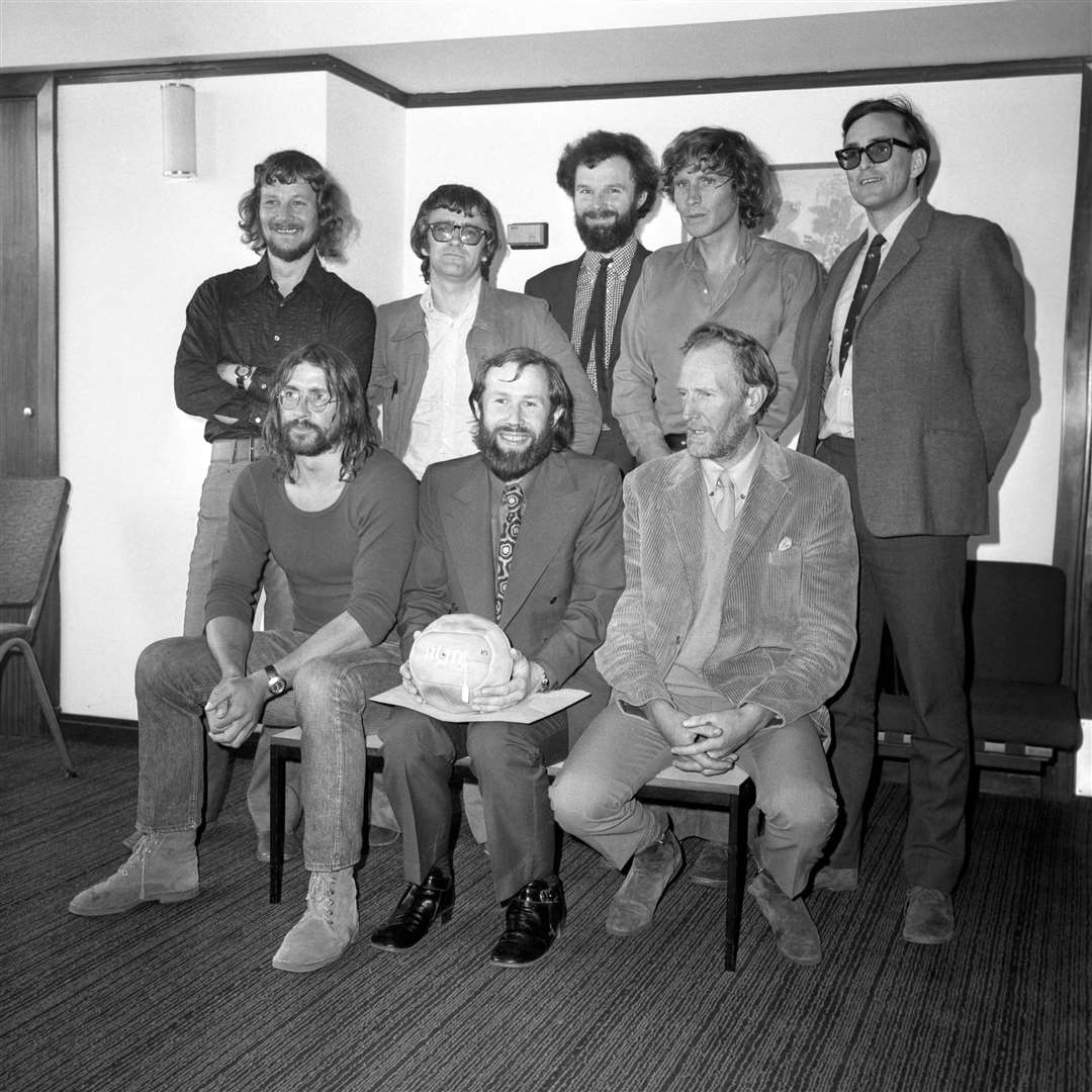 The first all-British team who scaled the south-west face of Mount Everest in 1975 including (standing) Graham Tiso, Mick Burke, Nick Estcourt, Dougal Haston and Barney Rosedale, with (seated) Doug Scott, expedition leader Chris Bonington and Mr MacInnes (PA)