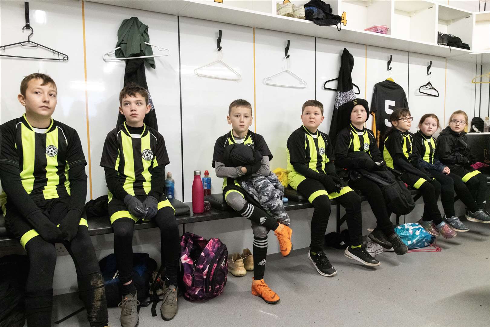 Mascots and ball boys and ball girls in the dressing room prior to the start of Huntly Women's first match...Huntly Women's F.C. v Inverurie Locos Works F.C Ladies at Christie Park...Picture: Beth Taylor.