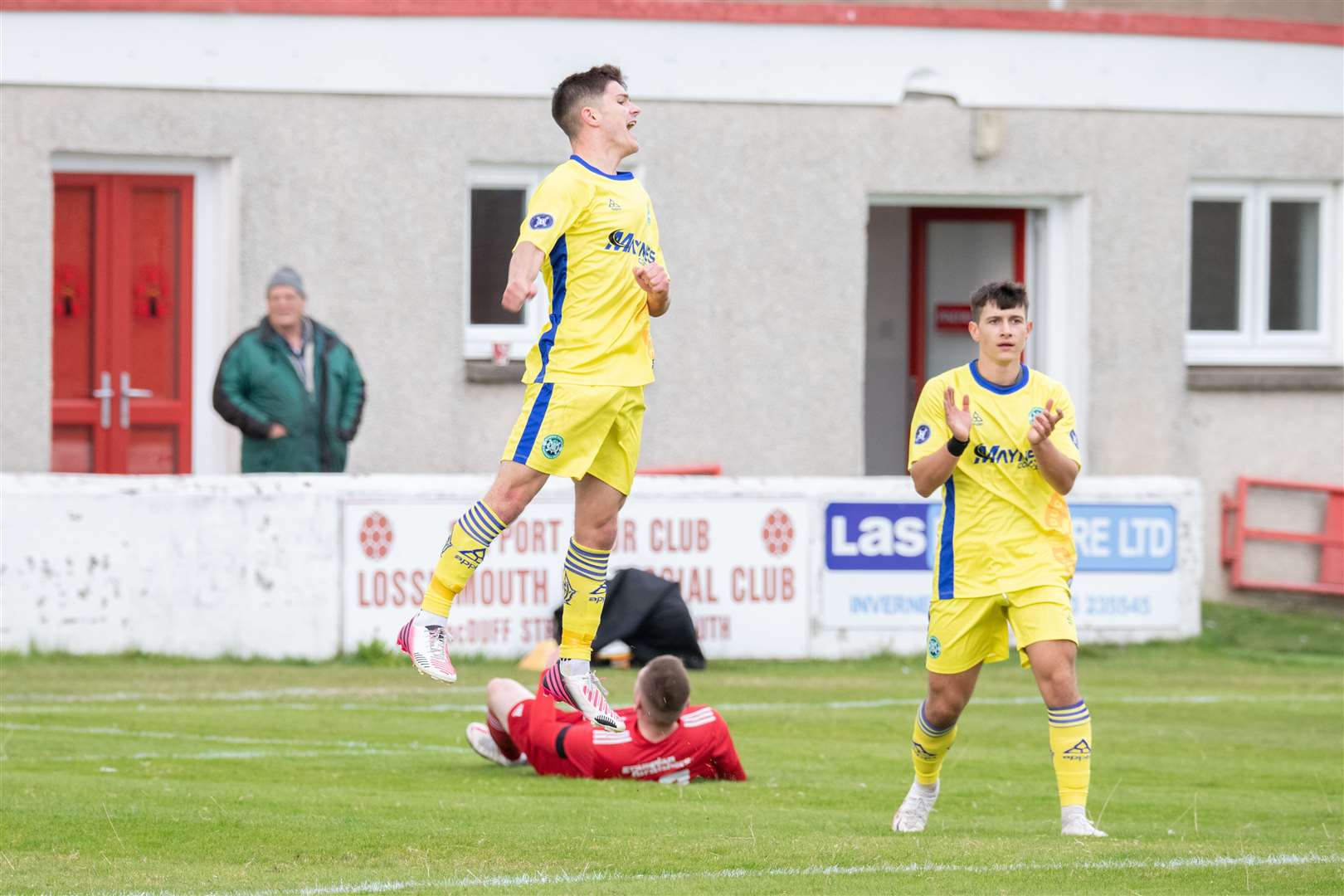 Buckie's Marcus Goodall wheels away to celebrate his second goal of the afternoon in the 2-1 win at Lossiemouth on Saturday. Picture: Daniel Forsyth..