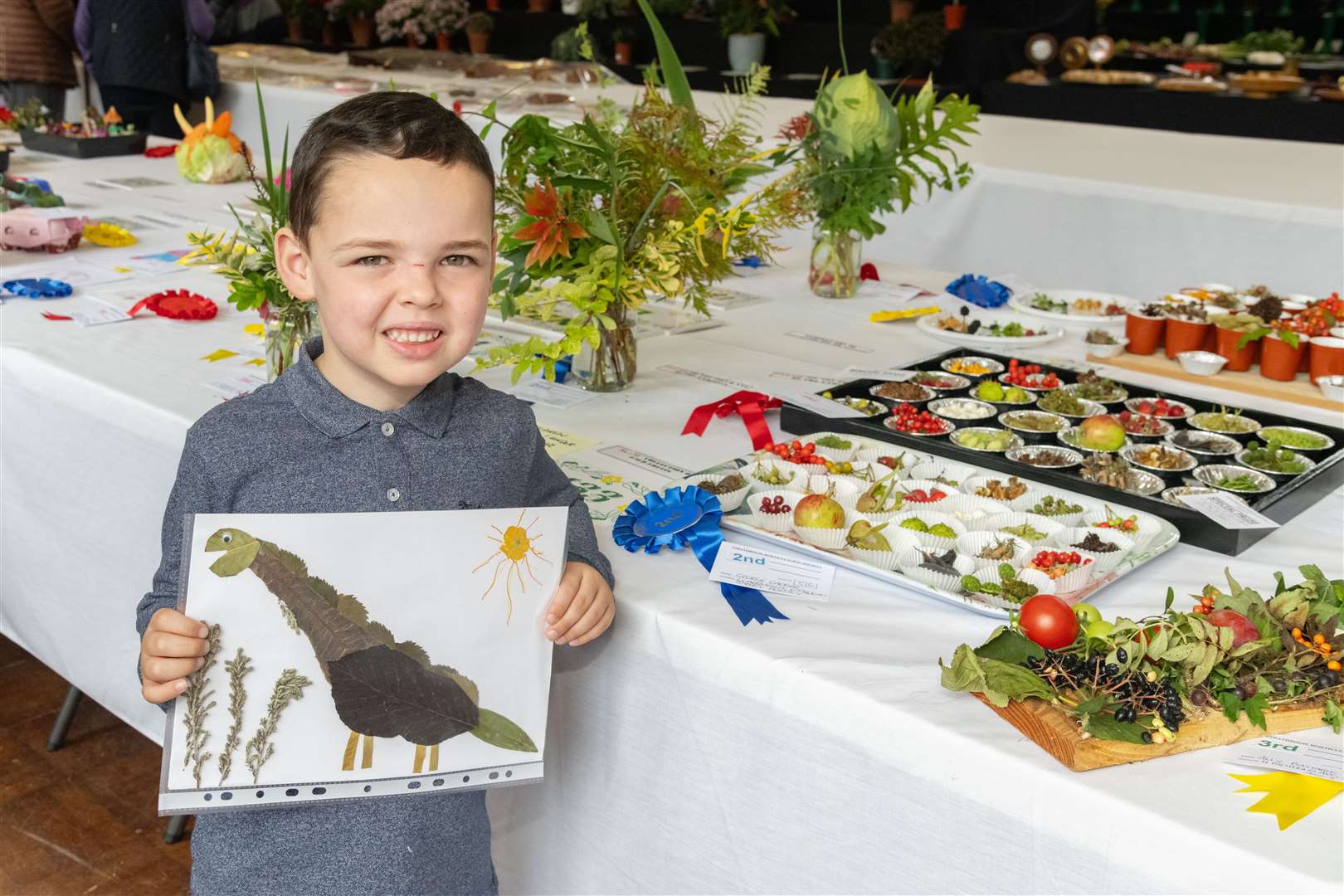George Cadger with his art and fruit entries...Strathbogie Horticultural Society Show 2023 at Gordon Schools in Huntly. ..Picture: Beth Taylor.