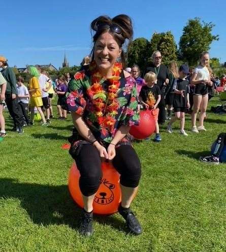 Kim Karam, Milne's headteacher at the time of the sports day, tries her hand with a space hopper. Picture: Milne's Primary