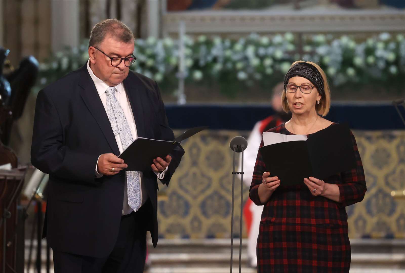 Sean Coll and Linda Irvine speaking during a service to mark the centenary of Northern Ireland at St Patrick’s Cathedral in Armagh (Liam McBurney/PA)