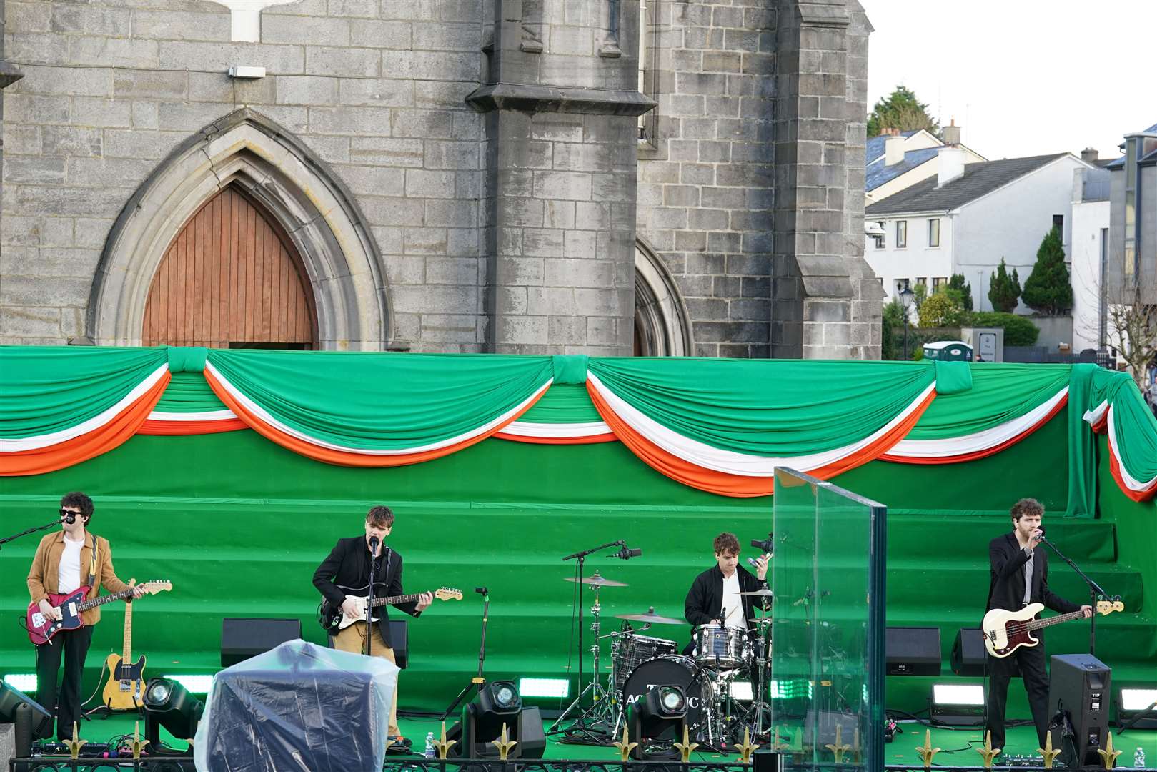 The Academic performing on stage before Joe Biden delivered a speech at St Muredach’s Cathedral in Ballina (Brian Lawless/PA)