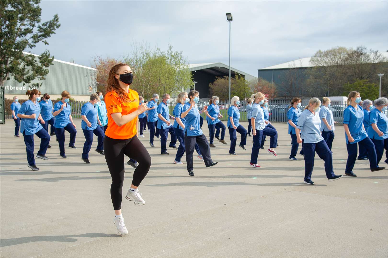 Dancer Lori Davidson (front) performs the moves to Jerusalema alongside the Fiona Elcock Vaccination Centre team in Elgin. Picture: Daniel Forsyth.