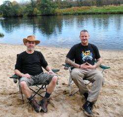 John Ord (left) is pictured relaxing after his ordeal with brother-in-law James Mackintosh, at the spot where he took his impromptu dip into the fast-flowing Spey.