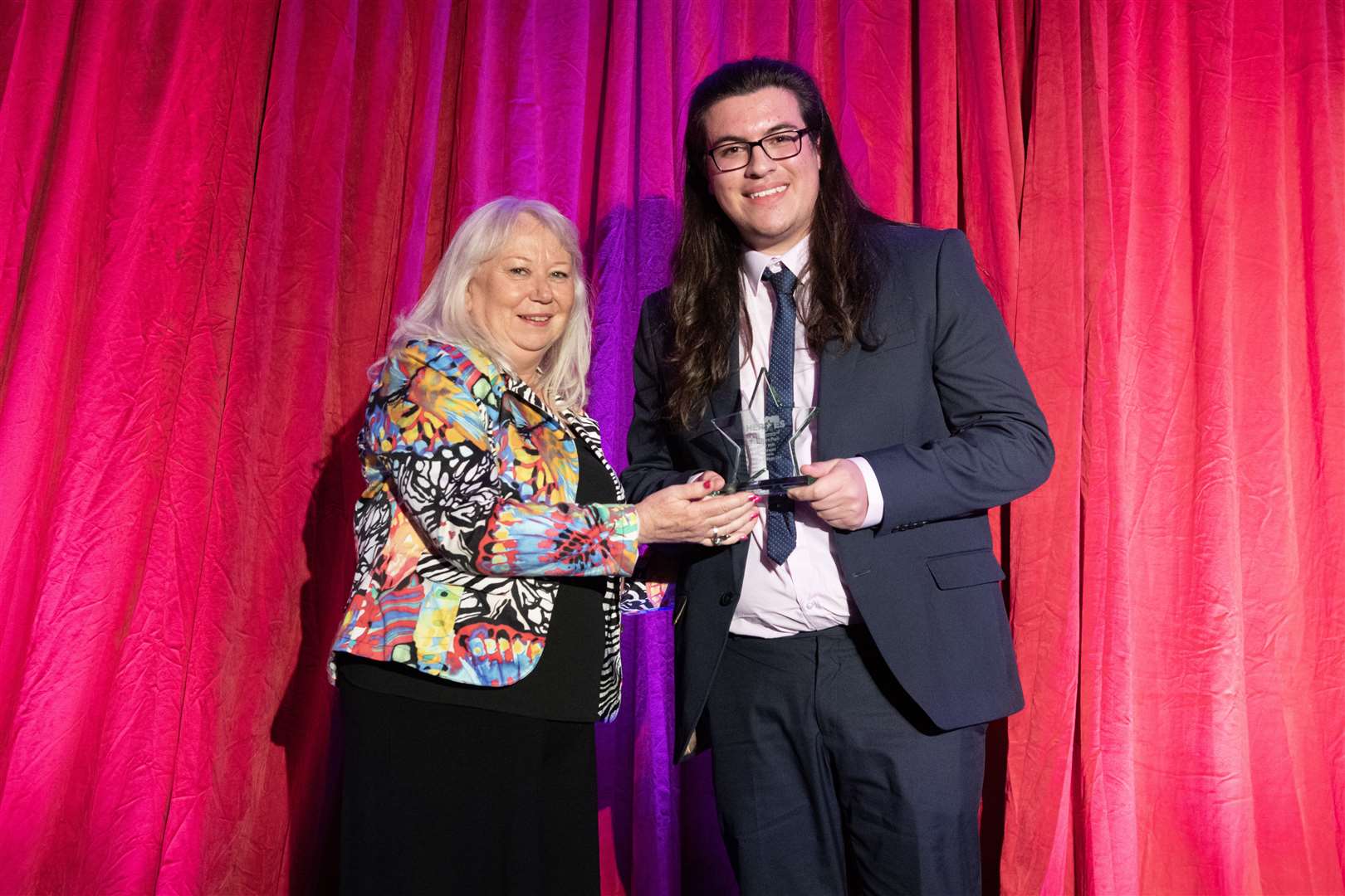 Ben Stewart was awarded Secondary Pupil of the Year Award. He is with sponsor Jackie Andrews, Head of Academic Partnerships at UHI Moray. Picture: Beth Taylor