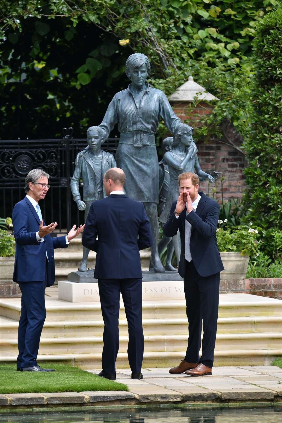 Sculptor Ian Rank-Broadley, the Duke of Cambridge and the Duke of Sussex after the unveiling of the statue (Dominic Lipinski/PA)