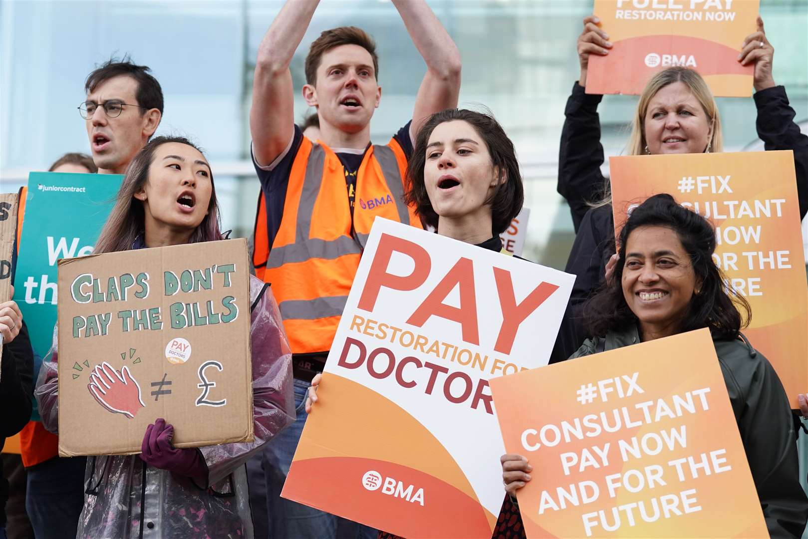 Junior doctors and medical consultants on the picket line outside University College Hospital, London (Stefan Rousseau/PA)