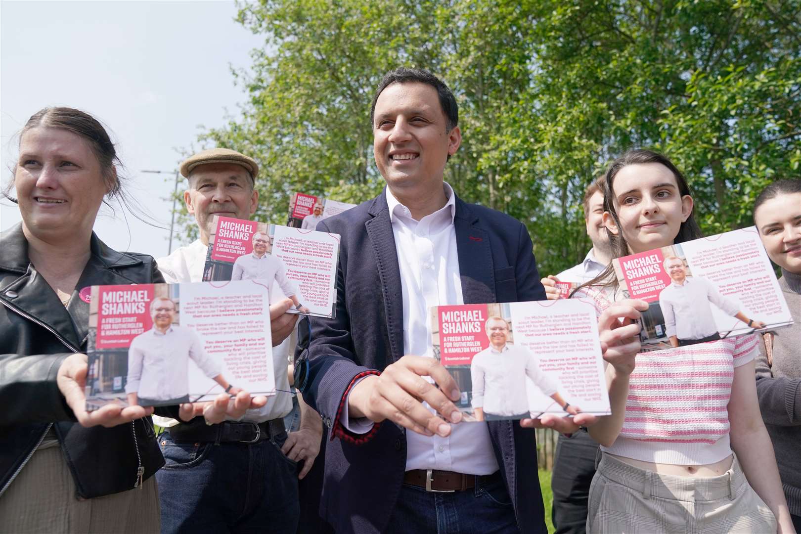Scottish Labour leader Anas Sarwar with campaigners in Cambuslang (Andrew Milligan/PA)