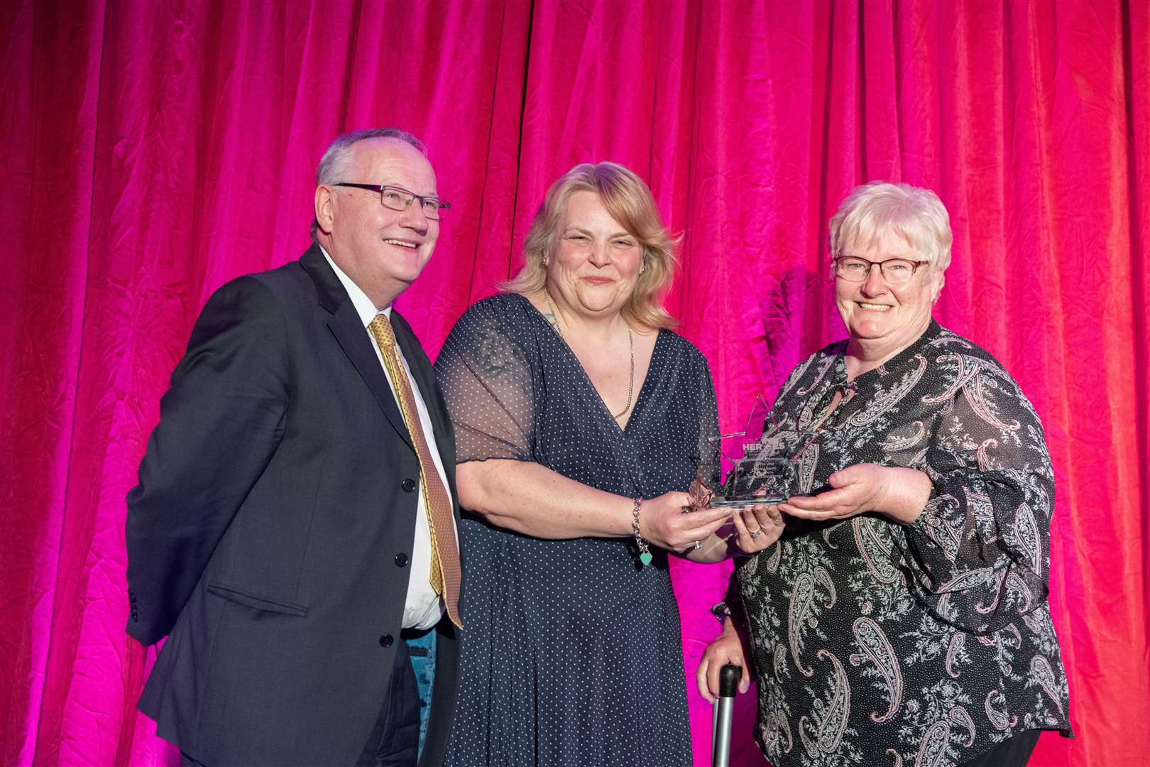 Buckie's Roots were named Community Champion of the Year and the award was presented by Roz Cassidy, the HR Manager of Walkers Shortbread (centre). Receiving the trophy were the group's Meg Jamieson and Gifford Leslie. Picture: Beth Taylor