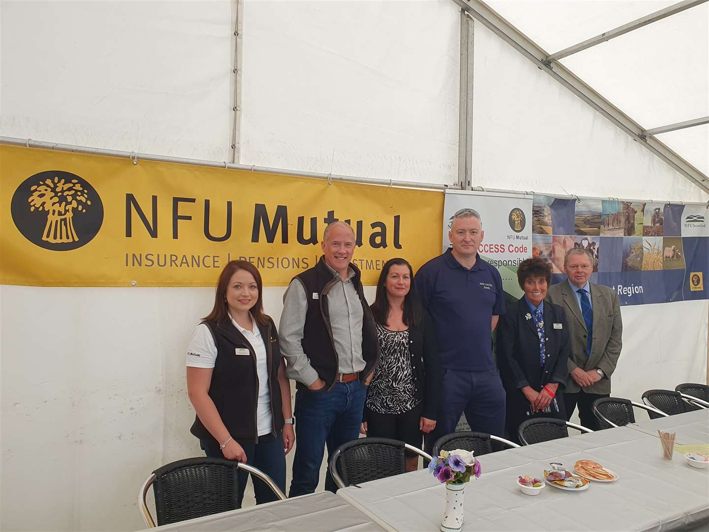 NFU Mutual agent Sarah Law, NFU Mutual senior agent Stephen Hepburn, Janice Garvock, Sandy Garvock, NFUS north east manager Lorna Patterson and NFUS vice president Andrew Connon mark NFU Mutual's donation to Men United, ahead of their expansion into Turriff.