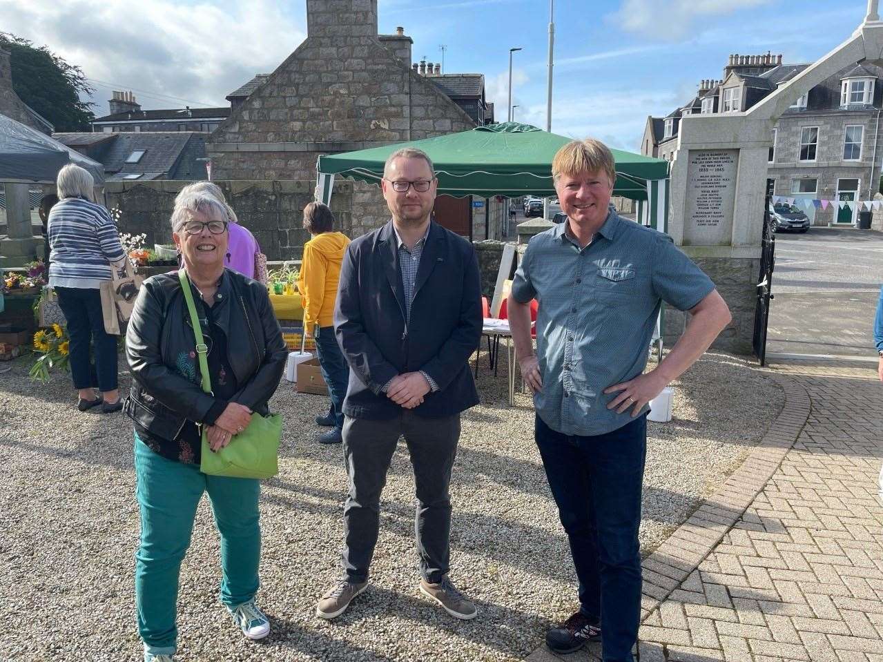 At the event are Val Reid from the Kintore Sustainability Group, MP Richard Thomson and Rev Neil Meyer of Kintore Parish Church.