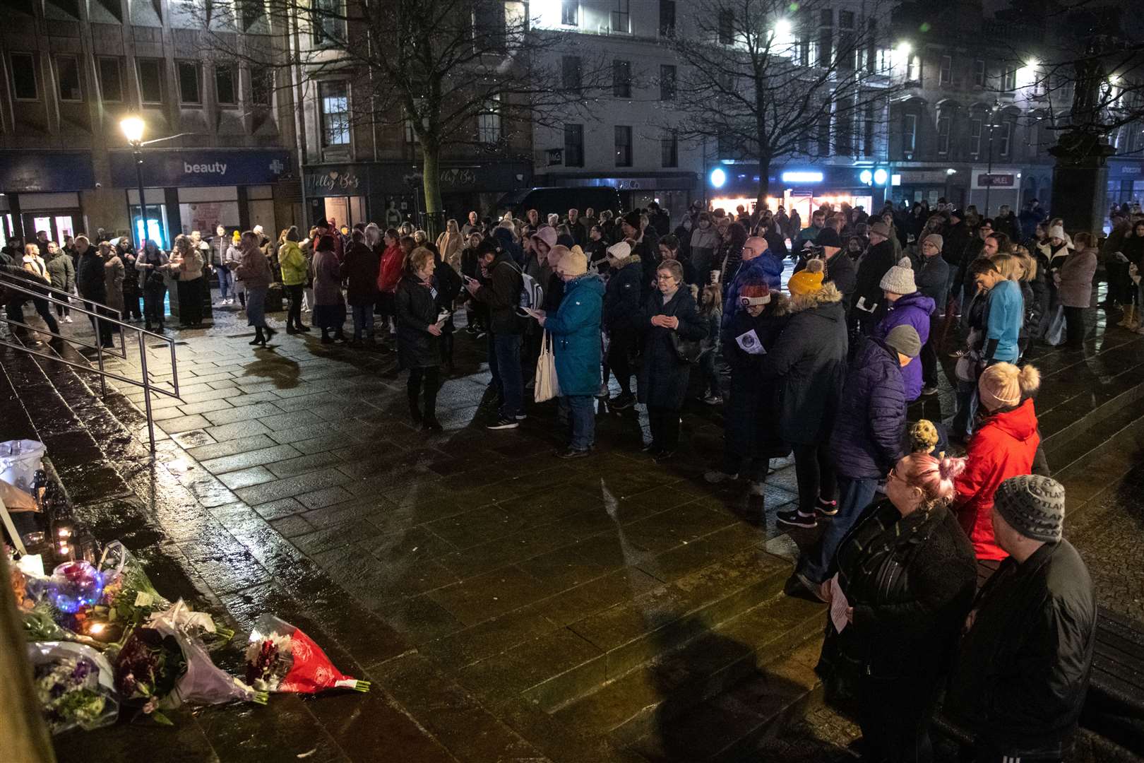 A vigil is held on the Plainstones in Elgin, outside St Giles' Church on Saturday night (February 11) in memory of Keith Rollinson. ..Picture: Daniel Forsyth..