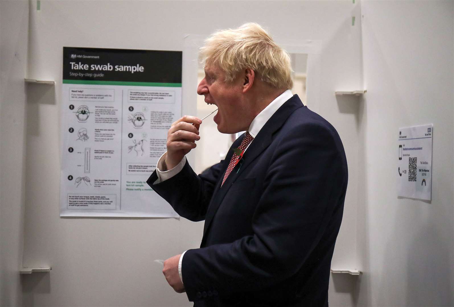 Prime Minister Boris Johnson takes a coronavirus test at a testing centre in De Montfort University in Leicester (Molly Darlington/PA)